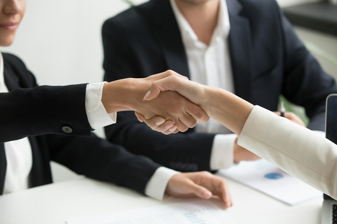 team handshake deal